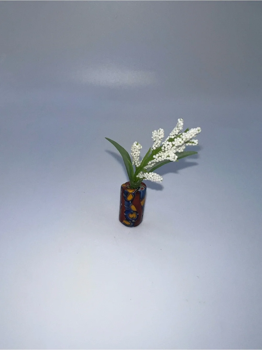 Miniature Decorative Vase with White Floral Spray